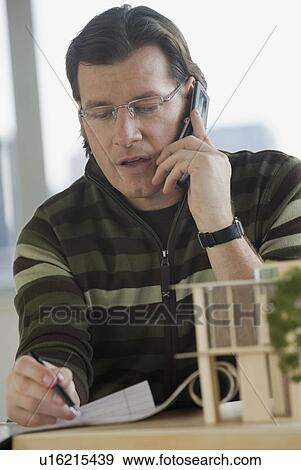 Man talking on cell phone View Large Photo Image Stock Photo - Man talking on cell phone. Fotosearch