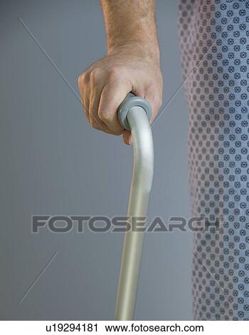 Man using walker View Large Photo Image Stock Image - Man using walker. Fotosearch