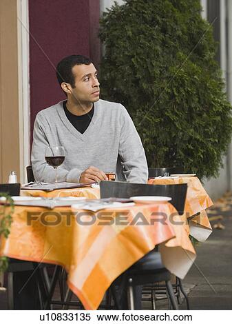 Man waiting for date in restaurant View Large Photo Image Stock Photography - Man waiting for date in restaurant. Fotosearch