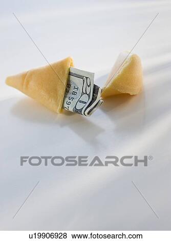 Money in fortune cookie View Large Photo Image Stock Photo - Money in fortune cookie. Fotosearch
