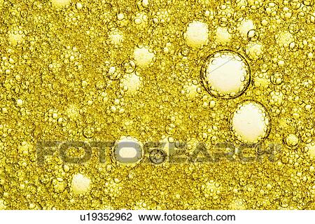 Stock Image - Olive oil bubbles. Fotosearch