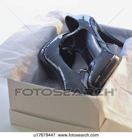 Stock Photo - Pair of high heels in box. Fotosearch