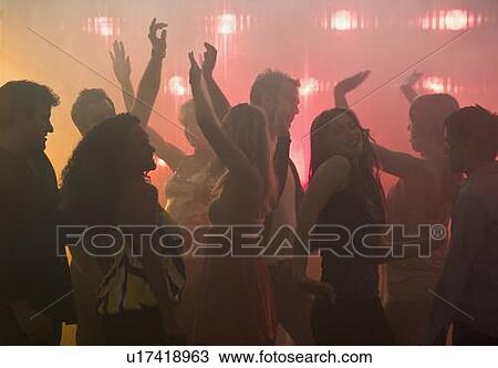 People dancing in nightclub View Large Photo Image Stock Image - People dancing in nightclub. Fotosearch