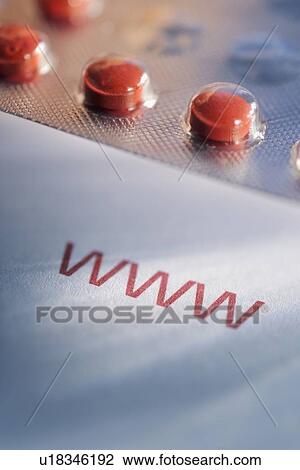 Stock Image - Pills and world wide web acronym. Fotosearch