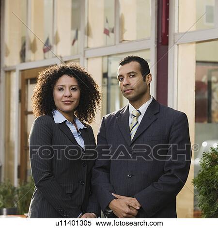 Stock Photography - Portrait of confident businesspeople. Fotosearch