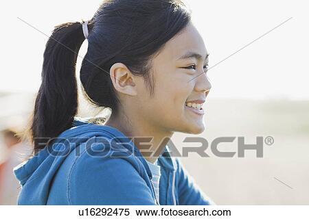 Stock Photography - Portrait of teenage girl. Fotosearch