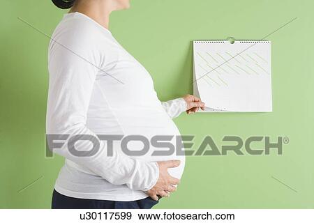 Pregnant woman View Large Photo Image Stock Photo - Pregnant woman . Fotosearch