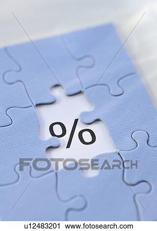 Stock Image - Puzzle and percent sign. Fotosearch
