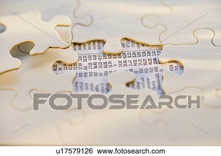 Puzzle pieces and stock numbers View Large Photo Image Stock Photograph - Puzzle pieces and stock numbers. Fotosearch