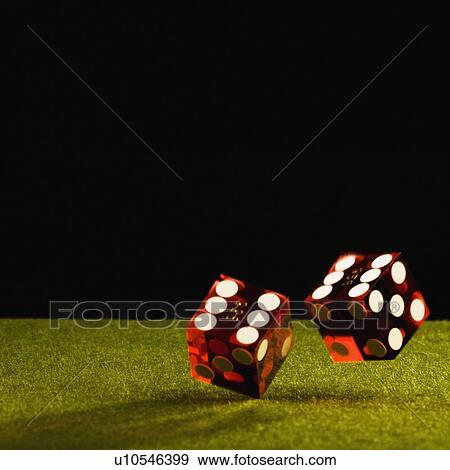 Stock Photo - Rolling dice. Fotosearch