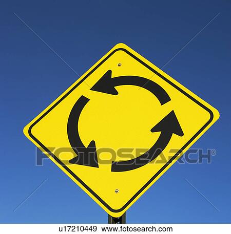 Stock Photo - Roundabout traffic sign. Fotosearch