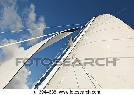 Sailboat and blue sky View Large Photo Image Stock Photo - Sailboat and blue sky. Fotosearch