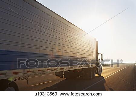 Stock Photo - Semi truck on highway. Fotosearch