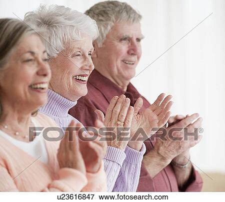 Senior adults clapping View Large Photo Image Stock Photo - Senior adults clapping. Fotosearch