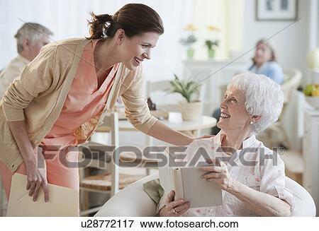 Senior woman reading book View Large Photo Image Stock Photo - Senior woman reading book. Fotosearch