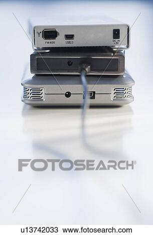 Stack of external hard drives View Large Photo Image Stock Image - Stack of external hard drives. Fotosearch