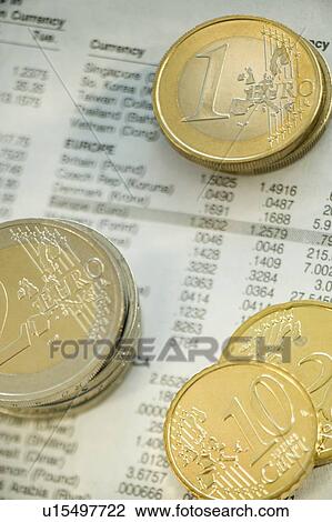Stacks of euro coins and exchange rates View Large Photo Image Stock Image - Stacks of euro coins and exchange rates. Fotosearch