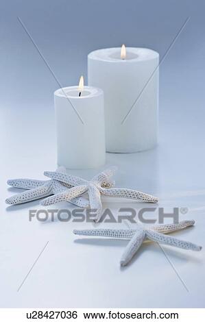 Stock Photograph - Starfish and candles. Fotosearch