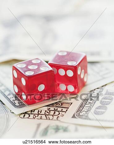 Picture - Stethoscope on pile of money. Fotosearch