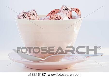 Tape measure in bowl View Large Photo Image Stock Photo - Tape measure in bowl. Fotosearch