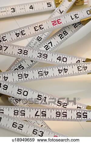 Tape measures View Large Photo Image Stock Photo - Tape measures. Fotosearch
