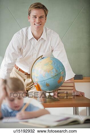 Teacher and student in classroom View Large Photo Image Stock Image - Teacher and student in classroom. Fotosearch