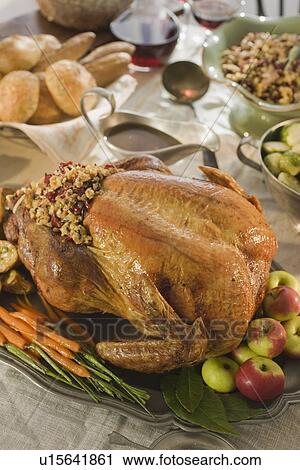 Thanksgiving dinner on table View Large Photo Image Stock Image - Thanksgiving dinner on table. Fotosearch