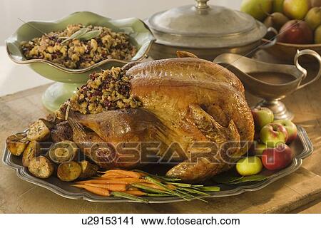 Thanksgiving dinner on table View Large Photo Image Stock Image - Thanksgiving dinner on table. Fotosearch