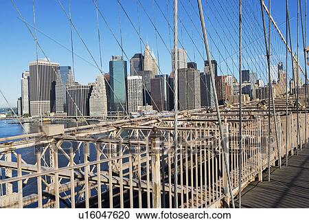 Stock Image - Urban bridge and cityscape. Fotosearch