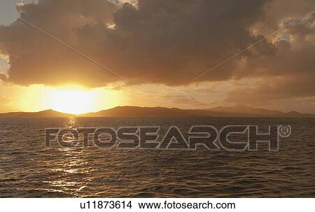 View of St. Thomas at sunset View Large Photo Image Picture - View of St. Thomas at sunset. Fotosearch