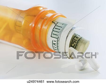Wedding ring on stack of cash View Large Photo Image Stock Image - Wedding ring on stack of cash. Fotosearch