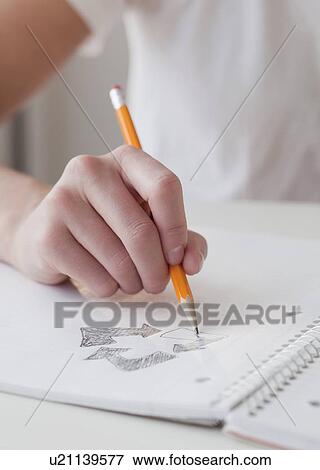 Stock Photo - Woman drawing picture of earth. Fotosearch