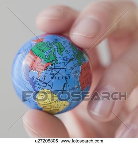 Stock Photography - Woman drawing recycling symbol. Fotosearch