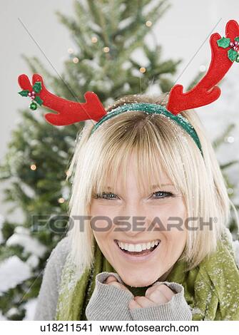 Woman dressed for snow at Christmas View Large Photo Image Stock Image - Woman dressed for snow at Christmas. Fotosearch