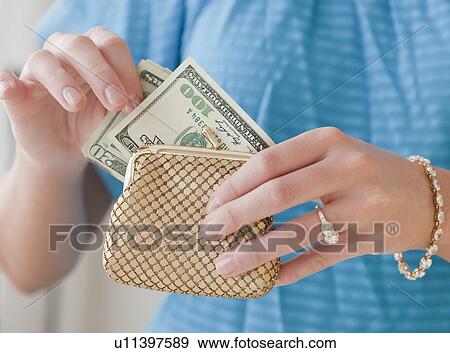 Woman holding granola in hands View Large Photo Image Stock Photo - Woman holding granola in hands. Fotosearch