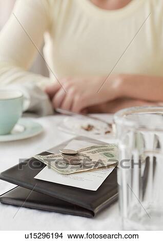Picture - Woman holding pair of dice. Fotosearch