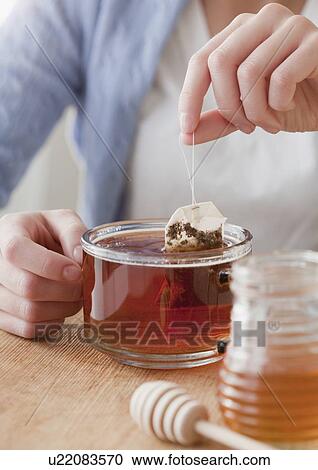 Woman holding small globe View Large Photo Image Stock Image - Woman holding small globe. Fotosearch