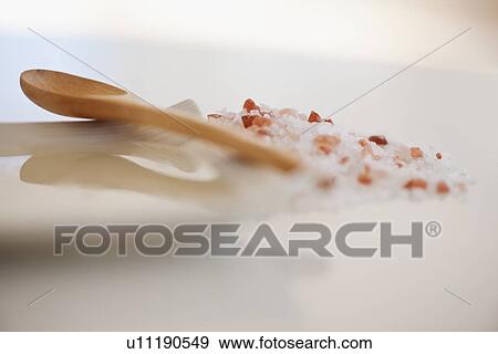 Wooden spoon and salt scrub View Large Photo Image Stock Photo - Wooden spoon and salt scrub. Fotosearch