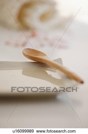 Wooden spoon and salt scrub View Large Photo Image Stock Photo - Wooden spoon and salt scrub. Fotosearch