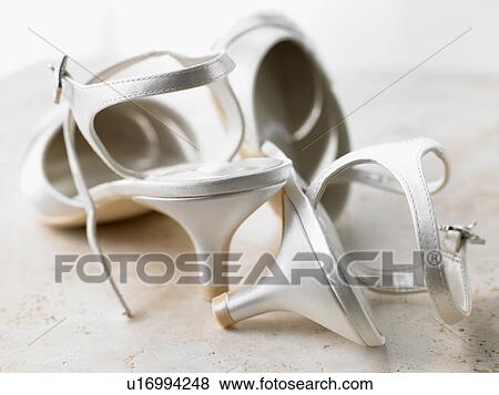 Abandoned Silver High Heels View Large Photo Image Stock Photo - Abandoned Silver High Heels. Fotosearch