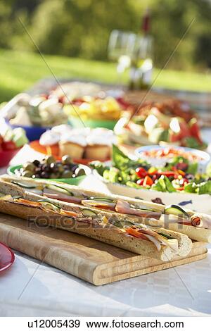 Al Fresco Dining, With Food Laid Out On Table View Large Photo Image Stock Photo - Al Fresco Dining, With Food Laid Out On Table. Fotosearch