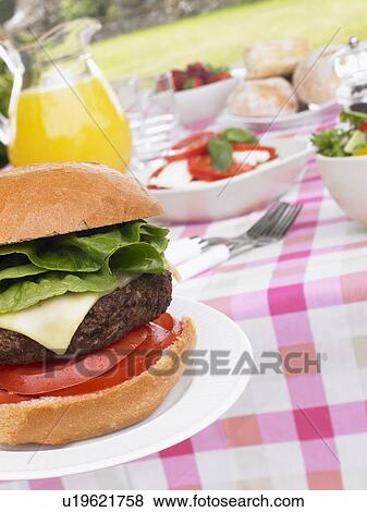 Al Fresco Dining With Hamburgers And Salad View Large Photo Image Stock Photo - Al Fresco Dining With Hamburgers And Salad. Fotosearch