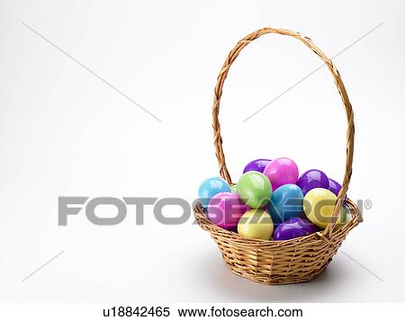 Basket Of Colorful Easter Eggs View Large Photo Image Stock Photography - Basket Of Colorful Easter Eggs. Fotosearch