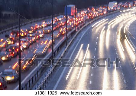 Blurred Tail Lights And Traffic Lights On Motorway View Large Photo Image Stock Photography - Blurred Tail Lights And Traffic Lights On Motorway. Fotosearch