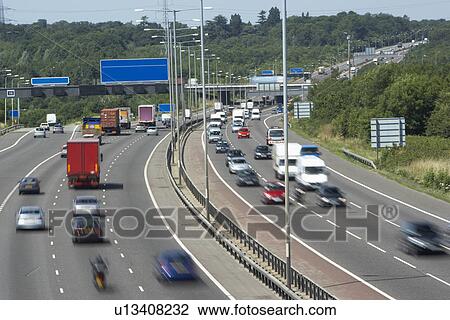 Stock Image - Blurred Traffic On A Busy Highway. Fotosearch