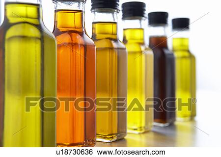 Bottles Of Olive Oil View Large Photo Image Stock Photograph - Bottles Of Olive Oil. Fotosearch