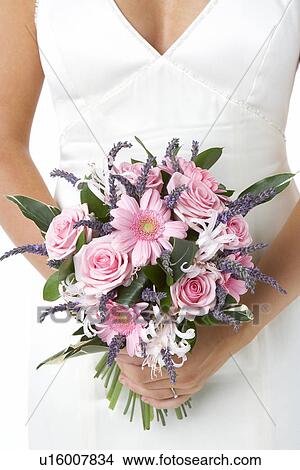 Bride Holding Bouquet Of Flowers View Large Photo Image Picture - Bride Holding Bouquet Of Flowers. Fotosearch