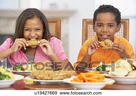 Brother And Sister Having Lunch Together At Home View Large Photo Image Stock Photo - Brother And Sister Having Lunch Together At Home. Fotosearch