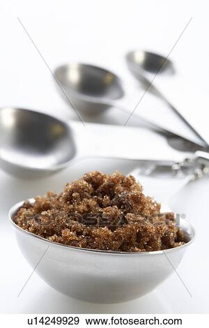 Brown Sugar In A Bowl With Measuring Spoons View Large Photo Image Stock Photo - Brown Sugar In A Bowl With Measuring Spoons. Fotosearch