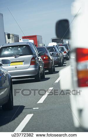 Cars Lined Up In A Traffic Jam On A Highway View Large Photo Image Stock Image - Cars Lined Up In A Traffic Jam On A Highway. Fotosearch